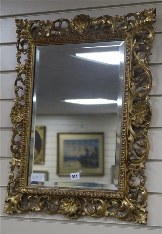 A hand carved florentine frame with mirror W.53cm